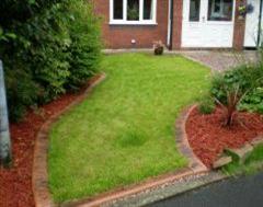 An Eurostyle Edge and a Turf Installation An Eurostyle Edge and a Turf Installation