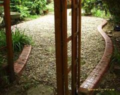 Eurostyle Slurried Path Edging to Enhance a Garden Area