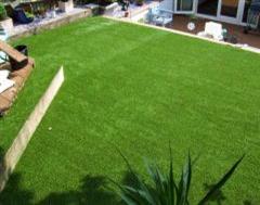A Raised Garden Area with Artificial Grass and in built Step in Somerset