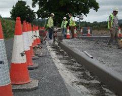 The team working well with this road kerbing job